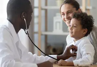 Doctor with Child Patient