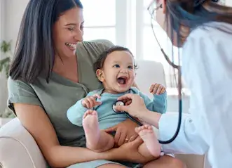 Doctor with Happy Baby